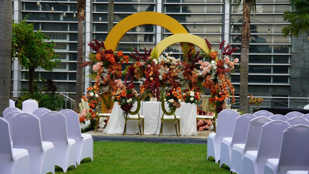 Wedding ceremony setup with beautiful floral arrangements.